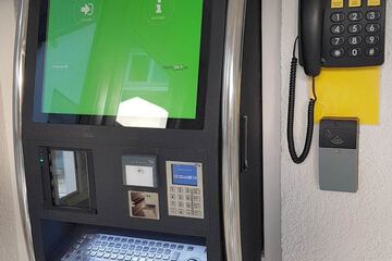 Check-in/check-out kiosk