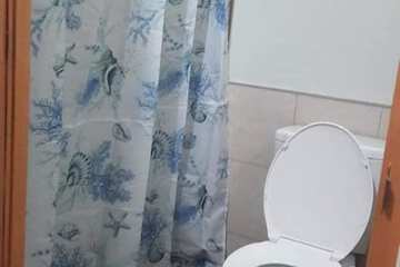 Raised toilet seat