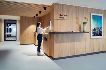 Check-in/check-out kiosk