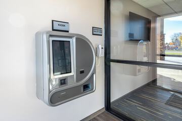 Check-in/check-out kiosk