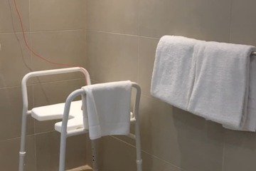 Portable shower seat