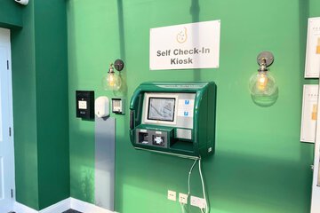 Check-in/check-out kiosk