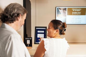 Check-in/check-out kiosk