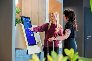 Check-in/check-out kiosk