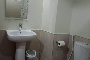 Raised toilet seat