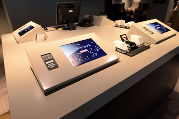 Check-in/check-out kiosk