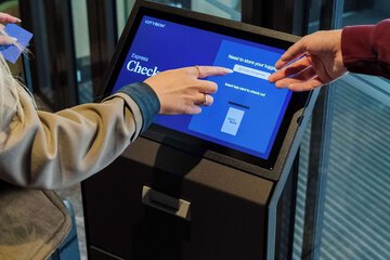 Check-in/check-out kiosk