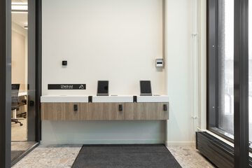 Check-in/check-out kiosk