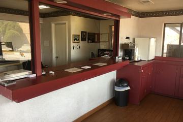 Check-in/check-out kiosk