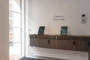 Check-in/check-out kiosk
