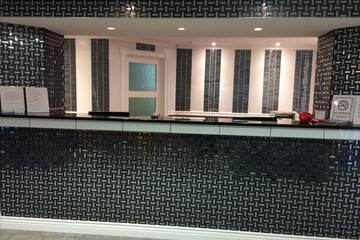 Check-in/check-out kiosk