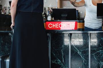 Check-in/check-out kiosk