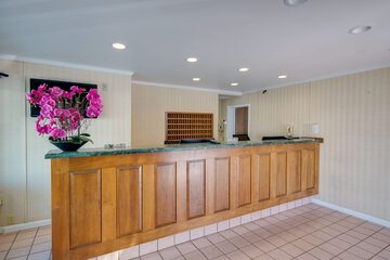 Check-in/check-out kiosk