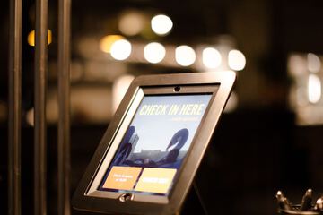 Check-in/check-out kiosk