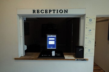 Check-in/check-out kiosk
