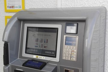 Check-in/check-out kiosk
