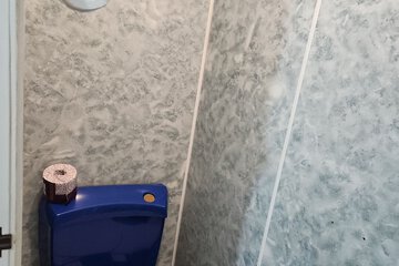 Raised toilet seat