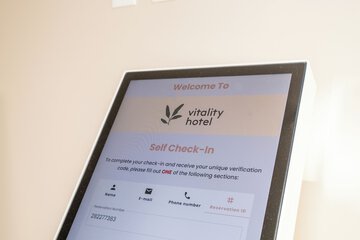 Check-in/check-out kiosk