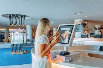 Check-in/check-out kiosk
