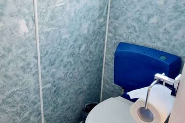 Raised toilet seat