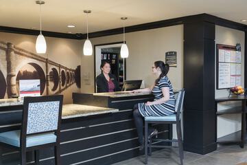Check-in/check-out kiosk