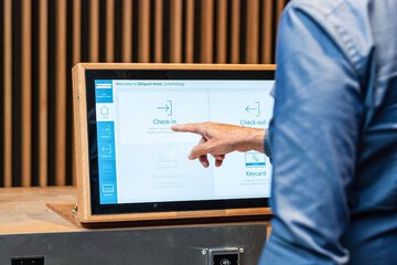 Check-in/check-out kiosk