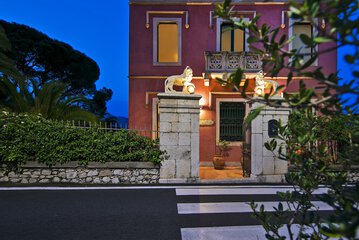 Front of property - evening/night