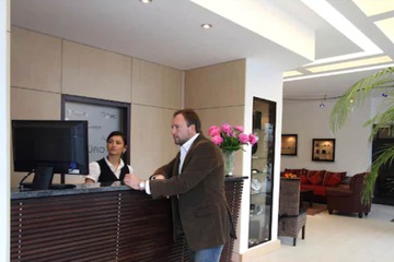 Check-in/check-out kiosk