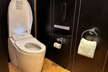 Raised toilet seat