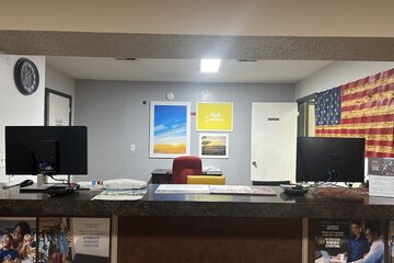 Check-in/check-out kiosk