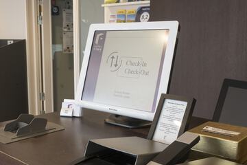 Check-in/check-out kiosk
