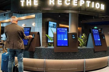 Check-in/check-out kiosk