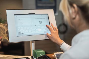 Check-in/check-out kiosk