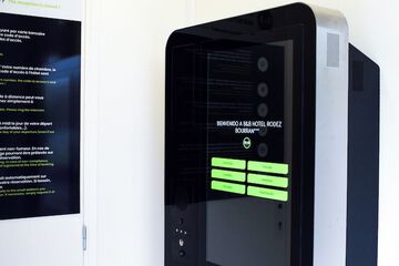 Check-in/check-out kiosk