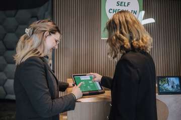 Check-in/check-out kiosk