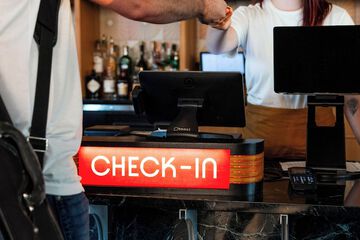 Check-in/check-out kiosk