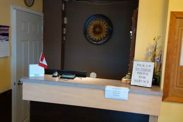 Check-in/check-out kiosk