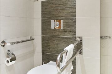 Raised toilet seat