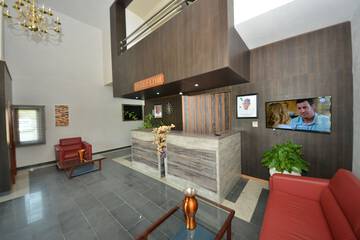 Check-in/check-out kiosk