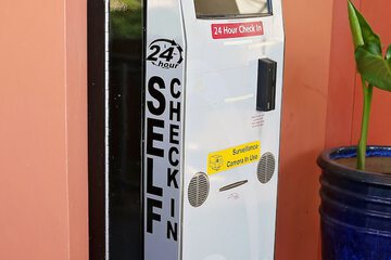 Check-in/check-out kiosk