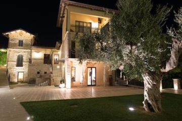Hotel Front - Evening or Night