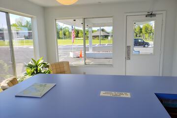 Check-in/check-out kiosk