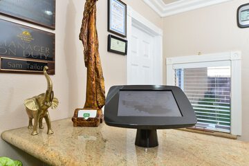 Check-in/check-out kiosk