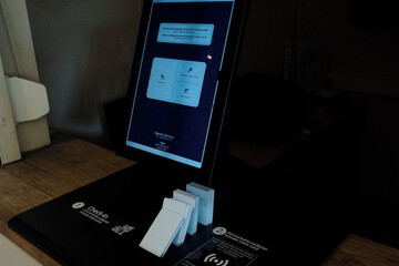 Check-in/check-out kiosk