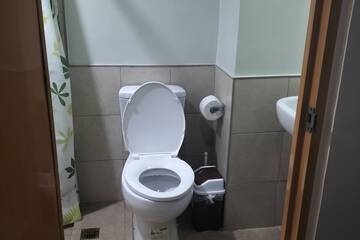 Raised toilet seat