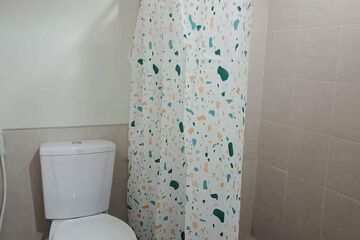 Raised toilet seat