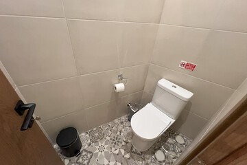 Raised toilet seat