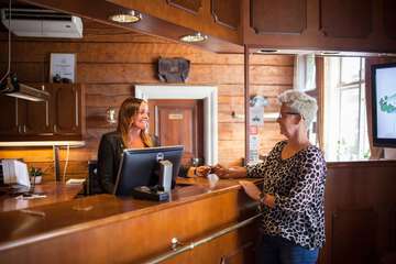 Check-in/check-out kiosk