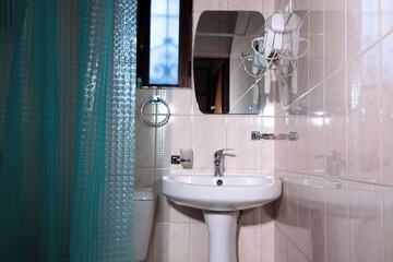 Raised toilet seat