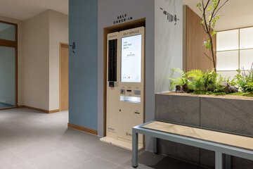 Check-in/check-out kiosk